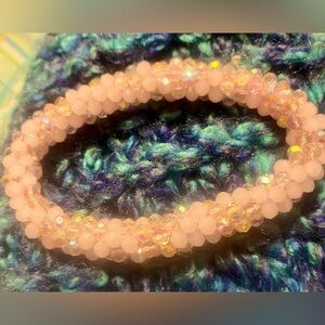 Pink beaded bracelet.